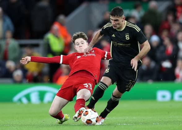 14th March 2024; Anfield, Liverpool, Merseyside, England; Europa League, Round of 16, Second Leg Football, Liverpool versus Sparta Prague; James McConnell of Liverpool tackles Qazim Laci of Sparta Prague  ActionPlus12618117 DavidxBlunsden