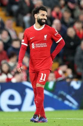 14th March 2024; Anfield, Liverpool, Merseyside, England; Europa League, Round of 16, Second Leg Football, Liverpool versus Sparta Prague; Mohammed Salah of Liverpool smiles after a goal scoring chance was missed by Darwin Nunez  ActionPlus12618105 DavidxBlunsden
