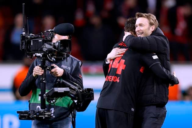 SCHICK Patrik Team Bayer 04 Leverkusen after the victory in the focus of the media with sports director ROLFES Simon UEFA Europa League season 2023 2024 Round of 16 match Bayer 04 Leverkusen Qarabag 3 2 on 15 03 2024 in Leverkusen DFL REGULATIONS PROHIBIT ANY USE OF PHOTOGRAPHS as IMAGE SEQUENCES and or QUASI VIDEO Copyright: xLacixPerenyix