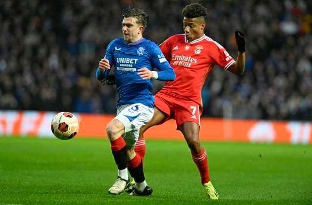 Glasgow, Scotland, 14th March 2024. Rõdvan Yõlmaz of Rangers and David Neres of Benfica during the UEFA Europa League Round of 16 match at Ibrox Stadium, Glasgow. Picture credit should read: Neil Hanna Sportimage EDITORIAL USE ONLY. No use with unauthorised audio, video, data, fixture lists, club league logos or live services. Online in-match use limited to 120 images, no video emulation. No use in betting, games or single club league player publications. SPI-3007-0037