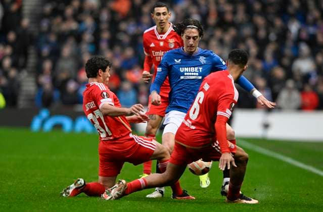 Glasgow, Scotland, 14th March 2024. Jo‹o Neves of Benfica, Fabio Silva of Rangers and Alexander Bah of Benfica during the UEFA Europa League Round of 16 match at Ibrox Stadium, Glasgow. Picture credit should read: Neil Hanna Sportimage EDITORIAL USE ONLY. No use with unauthorised audio, video, data, fixture lists, club league logos or live services. Online in-match use limited to 120 images, no video emulation. No use in betting, games or single club league player publications. SPI-3007-0046