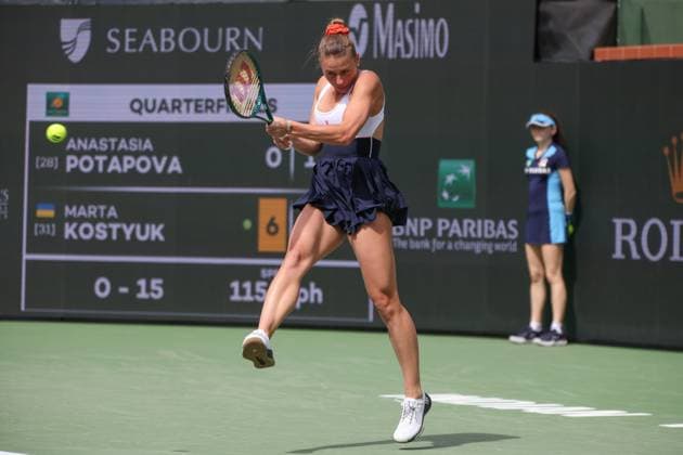 INDIAN WELLS, CA - MARCH 14: Marta Kostyuk (UKR) hits a backhand during the BNP Paribas Open on March 14, 2024 at Indian Wells Tennis Garden in Indian Wells, CA. (Photo by George Walker Icon Sportswire) TENNIS: MAR 14 BNP Paribas Open EDITORIAL USE ONLY Icon240314114