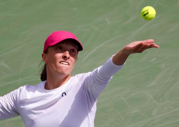 March 14, 2024 Iga Swiatek of Poland serves against Caroline Wozniacki of Denmark during the BNP Paribas Open in Indian Wells, CA. CSM Indian Wells United States of America - ZUMAc04_ 20240314_zma_c04_229 Copyright: xCharlesxBausx