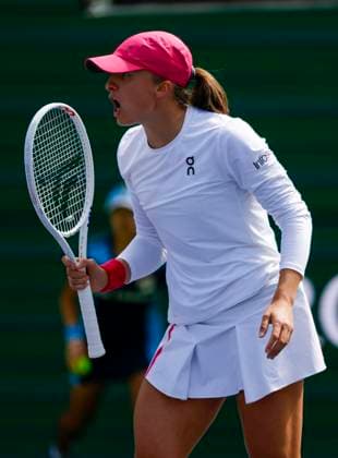 March 14, 2024 Iga Swiatek of Poland reacts to winning the first set against Caroline Wozniacki of Denmark during the BNP Paribas Open in Indian Wells, CA. CSM Indian Wells United States of America - ZUMAc04_ 20240314_zma_c04_239 Copyright: xCharlesxBausx