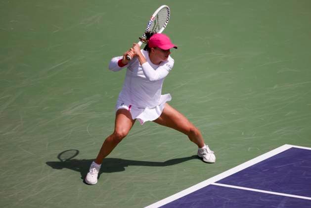 March 14, 2024 Iga Swiatek of Poland returns a shot against Caroline Wozniacki of Denmark during the BNP Paribas Open in Indian Wells, CA. CSM Indian Wells United States of America - ZUMAc04_ 20240314_zma_c04_227 Copyright: xCharlesxBausx