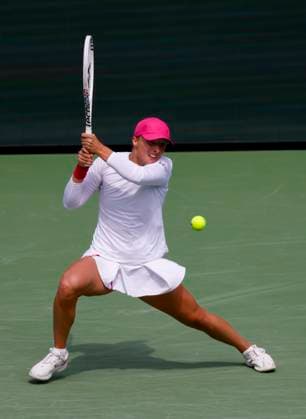 March 14, 2024 Iga Swiatek of Poland returns a shot against Caroline Wozniacki of Denmark during the BNP Paribas Open in Indian Wells, CA. CSM Indian Wells United States of America - ZUMAc04_ 20240314_zma_c04_265 Copyright: xCharlesxBausx