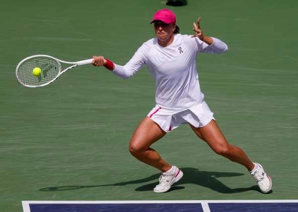 Tennis 2024: BNP Paribas Open MAR 14 March 14, 2024 Iga Swiatek of Poland returns a shot against Caroline Wozniacki of Denmark during the BNP Paribas Open in Indian Wells, CA. Charles Baus CSM (Credit Image: Â Charles Baus Cal Media) Indian Wells Ca United States of America EDITORIAL USE ONLY Copyright: xx ZUMA-20240314_zma_c04_272.jpg CharlesxBausx csmphotothree242281