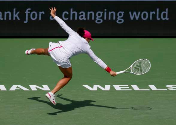 Tennis 2024: BNP Paribas Open MAR 14 March 14, 2024 Iga Swiatek of Poland leaps to play backhand against Caroline Wozniacki of Denmark during the BNP Paribas Open in Indian Wells, CA. Charles Baus CSM (Credit Image: Â Charles Baus Cal Media) Indian Wells Ca United States of America EDITORIAL USE ONLY Copyright: xx ZUMA-20240314_zma_c04_269.jpg CharlesxBausx csmphotothree242284