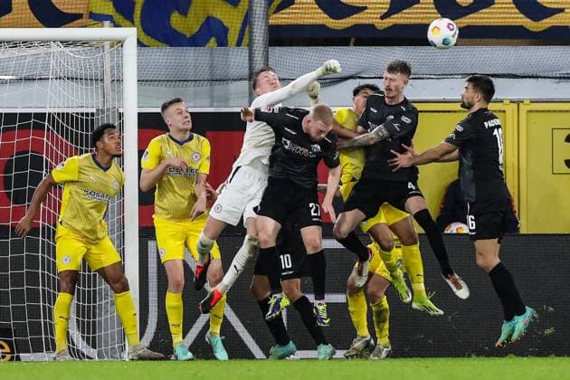 Goalkeeper Ron Thorben Hoffmann Eintracht Braunschweig,1 vs Kai Klefisch SC Paderborn,27 and Calvin Brackelmann SC Paderborn,4 2 Soccer Bundesliga Season 2023 2024 SC Paderborn vs Eintracht Braunschweig at the Home Deluxe Arena in Paderborn Action,Soccer,Man,Men,Germany,15 03 2024