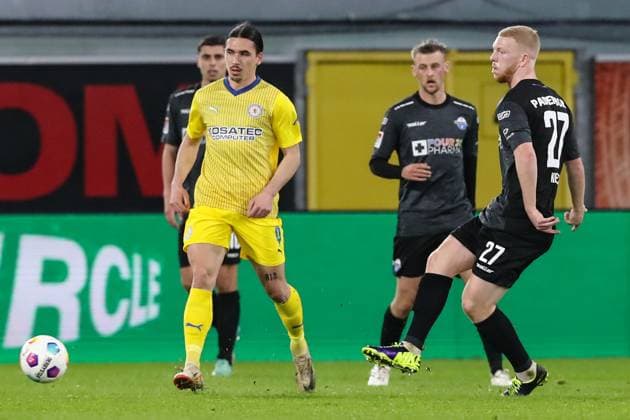 Rayan Philippe Eintracht Braunschweig,9 vs Kai Klefisch SC Paderborn,27 2 Soccer Bundesliga Season 2023 2024 SC Paderborn vs Eintracht Braunschweig at the Home Deluxe Arena in Paderborn Action,Soccer,Man,Men,Germany,15 03 2024