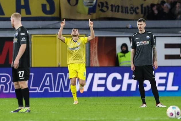 Goalscorer Hasan Kurucay Eintracht Braunschweig,29 scores from the penalty spot to 0 1 2 Soccer Bundesliga Season 2023 2024 SC Paderborn vs Eintracht Braunschweig at the Home Deluxe Arena in Paderborn Action,Soccer,Man,Men,Germany,15 03 2024