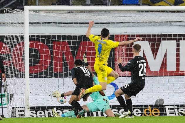Goalscorer Rayan Philippe Eintracht Braunschweig,9 scores to 1 2 2 Soccer Bundesliga Season 2023 2024 SC Paderborn vs Eintracht Braunschweig at the Home Deluxe Arena in Paderborn Action,Soccer,Man,Men,Germany,15 03 2024