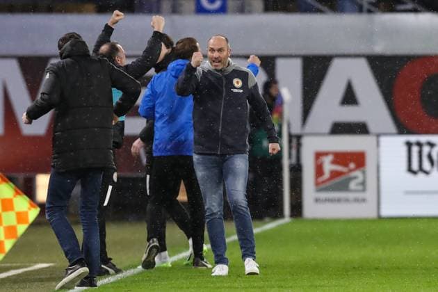 Goal celebration coach Daniel Scherning Eintracht Braunschweig goal scorer Rayan Philippe Eintracht Braunschweig,9 scores to 1 2 2 Soccer Bundesliga season 2023 2024 SC Paderborn vs Eintracht Braunschweig at the Home Deluxe Arena in Paderborn action,soccer,man,men,Germany,15 03 2024