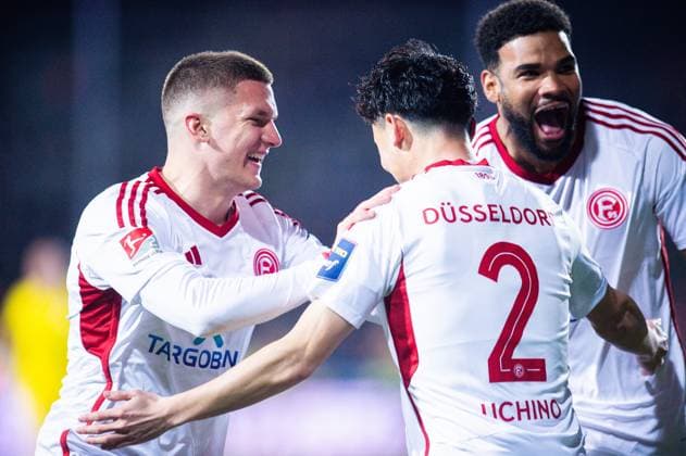 15 03 2024 Soccer, 2023 2024, 2 Bundesliga, Matchday 26, VfL Osnabrück Fortuna Düsseldorf M R Takashi Uchino Düsseldorf celebrates after his goal to 0 2 with R Jamil Siebert Düsseldorf , L Christos Tzolis Düsseldorf DFL REGULATIONS PROHIBIT ANY USE OF PHOTOGRAPHS AS IMAGE SEQUENCES AND OR QUASI VIDEO
