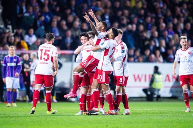 15 03 2024 Soccer, 2023 2024, 2 Bundesliga, Matchday 26, VfL Osnabrück Fortuna Dusseldorf Cheering crowd after the goal to 0 3 by M Marlon Mustapha Dusseldorf , R Jamil Siebert Dusseldorf lifts him up DFL REGULATIONS PROHIBIT ANY USE OF PHOTOGRAPHS AS IMAGE SEQUENCES AND OR QUASI VIDEO
