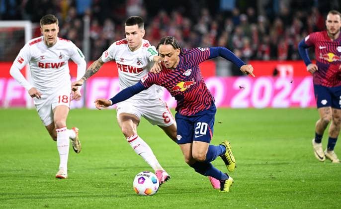 Football, Bundesliga, Germany, Men, Season 2023 2024, Matchday 26, Rhein Energie Stadion Köln, 1 FC Köln RB Leipzig Xavi Simons RBL , Denis Huseinbasic KOE Aktion DFB DFL REGULATIONS PROHIBIT ANY USE OF PHOTOGRAPHS AS IMAGE SEQUENCES AND OR QUASI VIDEO