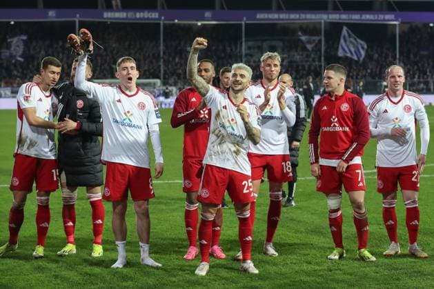 2 Bundesliga VfL Osnabrück Fortuna Düsseldorf on 15 03 2024 at the Bremer Brücke in Osnabrück Cheers and joy about the victory at the team of Fortuna Düsseldorf with Isak Bergmann Johannesson Duesseldorf and Matthias Zimmermann Duesseldorf 25 MH