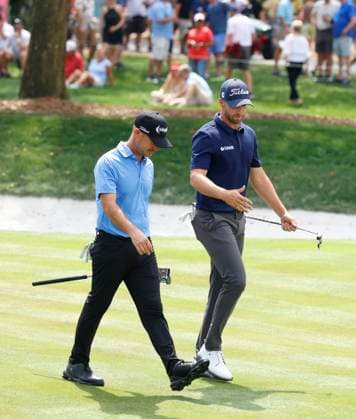 PONTE VEDRA BEACH, FL - MARCH 15: PGA, Golf Herren golfer Wyndham Clark and Brian Harman walk the 9th hole during The Players Championship on March 15, 2024, at TPC Sawgrass in Ponte Vedra Beach, Florida. (Photo by Brian Spurlock Icon Sportswire) GOLF: MAR 15 PGA THE PLAYERS Championship EDITORIAL USE ONLY Icon2403158