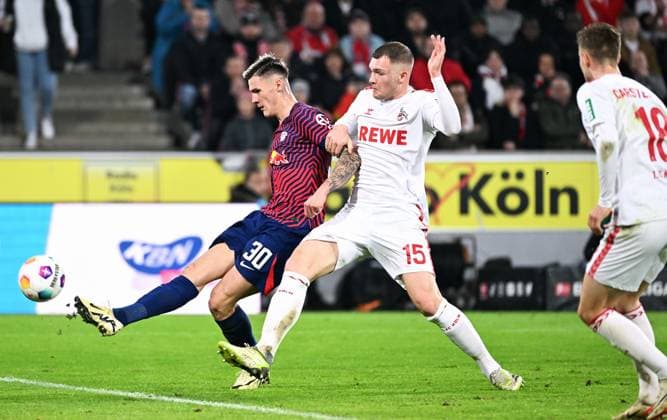 Football, Bundesliga, Germany, Men, Season 2023 2024, Matchday 26, Rhein Energie Stadion Köln, 1 FC Köln RB Leipzig Benjamin Sesko RBL , Luca Kilian KOE Aktion DFB DFL REGULATIONS PROHIBIT ANY USE OF PHOTOGRAPHS AS IMAGE SEQUENCES AND OR QUASI VIDEO