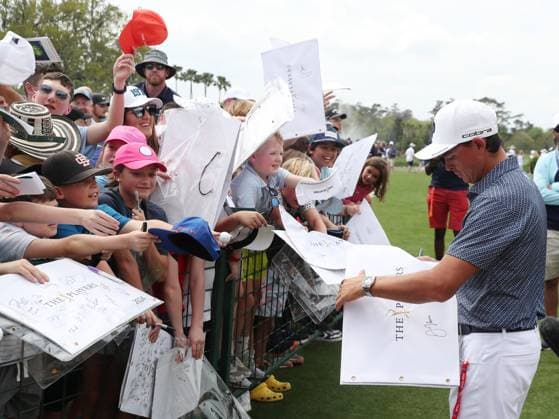 PONTE VEDRA BEACH, FL - MARCH 15: PGA, Golf Herren golfer Rickie Fowler signs autographs after finishing his second round during The Players Championship on March 15, 2024, at TPC Sawgrass in Ponte Vedra Beach, Florida. (Photo by Brian Spurlock Icon Sportswire) GOLF: MAR 15 PGA THE PLAYERS Championship EDITORIAL USE ONLY Icon24031543