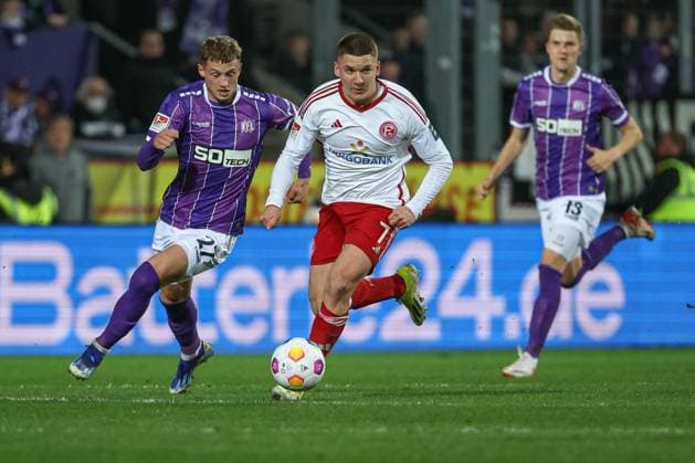 2 Bundesliga VfL Osnabrück Fortuna Düsseldorf on 15 03 2024 at Bremer Brücke in Osnabrück Mickaël Michael Cuisance Osnabrueck 27 vs Christos Tzolis Duesseldorf 7 MH