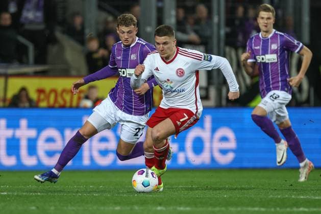 2 Bundesliga VfL Osnabrück Fortuna Düsseldorf on 15 03 2024 at Bremer Brücke in Osnabrück Mickaël Michael Cuisance Osnabrueck 27 vs Christos Tzolis Duesseldorf 7 MH