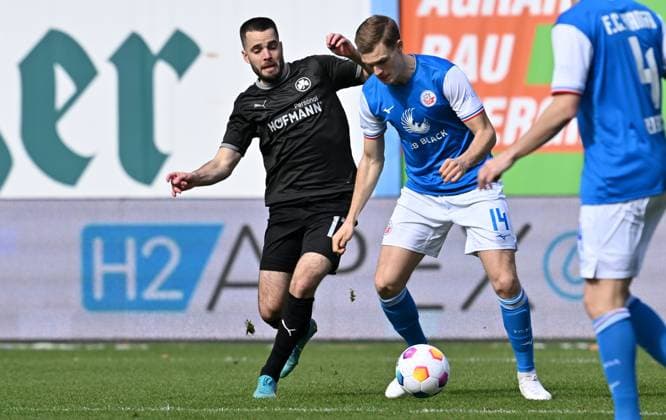 16 03 2024 Soccer Season 2023 2024 2 Soccer Bundesliga 26 Matchday FC Hansa Rostock FCH SpVgg Greuther Fürth Kleeblatt Sportfoto Zink xwoxzix DFL regulations prohibit any use of photographs as image sequences and or quasi video only for editorial use Niko Gießelmann Giesselmann 17, SpVgg Greuther Fürth Svante Ingelsson 14, FC Hansa Rostock FCH