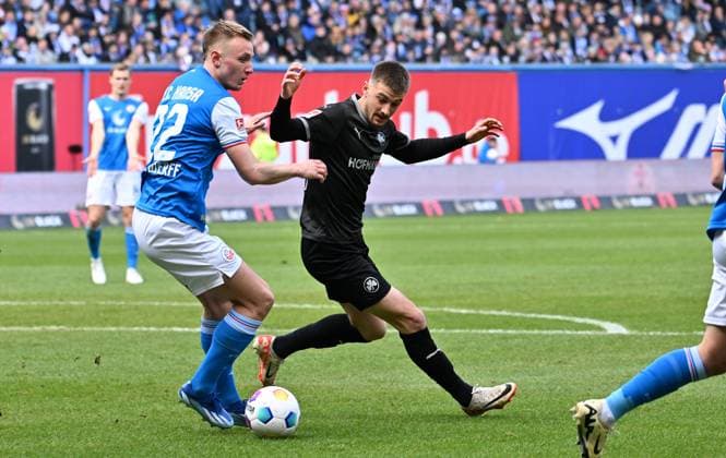 16 03 2024 Soccer Season 2023 2024 2 Soccer Bundesliga 26 Matchday FC Hansa Rostock FCH SpVgg Greuther Fürth Kleeblatt Sportfoto Zink xwoxzix DFL regulations prohibit any use of photographs as image sequences and or quasi video only for editorial use Jasper van der Werff 22, FC Hansa Rostock FCH Lukas Petkov 16, SpVgg Greuther Fürth