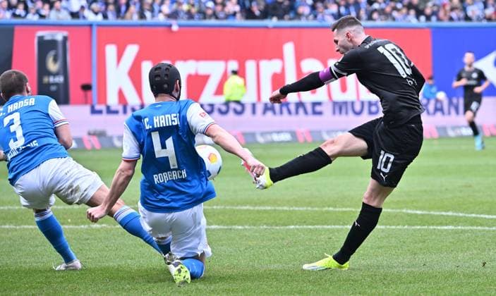 16 03 2024 Soccer Season 2023 2024 2 Soccer Bundesliga 26 Matchday FC Hansa Rostock FCH SpVgg Greuther Fürth Kleeblatt Sportfoto Zink xwoxzix DFL regulations prohibit any use of photographs as image sequences and or quasi video only for editorial use of links Konstantinos Stayfilidis 3, FC Hansa Rostock FCH Damian Roßbach Rossbach 4, FC Hansa Rostock FCH Branimir Hrgota 10 SpVgg Greuther Fürth