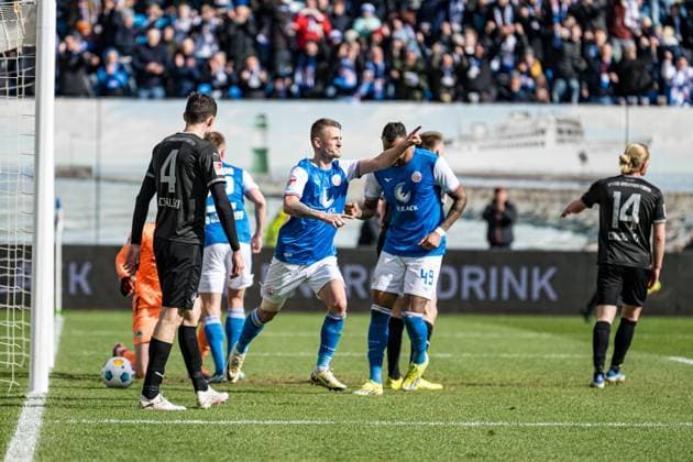 Rostock, Germany March 16, 2024 2 BL 2023 2024 FC Hansa Rostock vs Greuther Fürth In picture 4 from left Nico Neidhart Hansa Rostock cheers after his goal for 1 0 DFL regulations prohibit any use of photographs as image sequences and or quasi video Copyright: xFotostandx xVoelkerx
