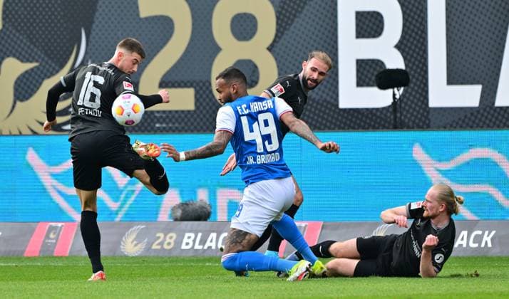 16 03 2024 Soccer season 2023 2024 2 Soccer Bundesliga 26 Matchday FC Hansa Rostock FCH SpVgg Greuther Fürth Kleeblatt Sportfoto Zink MeZi xmexzix DFL regulations prohibit any use of photographs as image sequences and or quasi video only for editorial use from left Lukas Petkov 16, SpVgg Greuther Fürth Junior Brumado 49, FC Hansa Rostock FCH Simon Asta 2, SpVgg Greuther Fürth Jomaine Consbruch 14, SpVgg Greuther Fürth