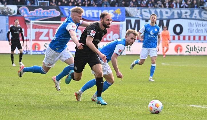 16 03 2024 Soccer Season 2023 2024 2 Soccer Bundesliga 26 Matchday FC Hansa Rostock FCH SpVgg Greuther Fürth Kleeblatt Sportfoto Zink xwoxzix DFL regulations prohibit any use of photographs as image sequences and or quasi video only for editorial use Simon Asta 2, SpVgg Greuther Fürth vs Kevin Schumacher 13, FC Hansa Rostock FCH Simon Rhein 8, FC Hansa Rostock FCH , right