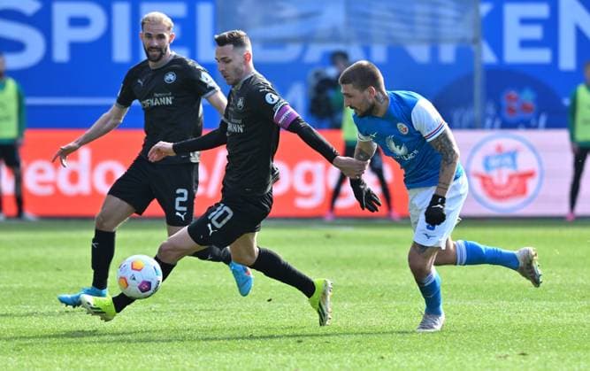 16 03 2024 Soccer Season 2023 2024 2 Soccer Bundesliga 26 Matchday FC Hansa Rostock FCH SpVgg Greuther Fürth Kleeblatt Sportfoto Zink xwoxzix DFL regulations prohibit any use of photographs as image sequences and or quasi video only for editorial use Simon Asta 2, SpVgg Greuther Fürth Branimir Hrgota 10 SpVgg Greuther Fürth Konstantinos Stayfilidis 3, FC Hansa Rostock FCH