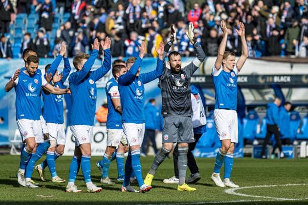 Rostock, Germany March 16, 2024 2 BL 2023 2024 FC Hansa Rostock vs Greuther Fürth In the picture Final cheer, The team of Hansa Rostock celebrates the home victory DFL regulations prohibit any use of photographs as image sequences and or quasi video Copyright: xFotostandx xVoelkerx