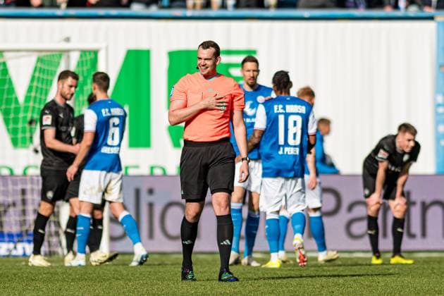 Rostock, Germany 16 March 2024 2 BL 2023 2024 FC Hansa Rostock vs Greuther Fürth In the picture Referee Richard Hempel is also happy about the finished match DFL regulations prohibit any use of photographs as image sequences and or quasi video Copyright: xFotostandx xVoelkerx