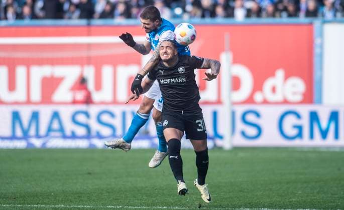 16 03 2024, Soccer, GER, Men, 2 Soccer Bundesliga, 2 Bundesliga, 2 FBL, Matchday 26, FC Hansa Rostock SpVgg Greuther Fürth 1 0 Konstantinos Stafylidis FC Hansa Rostock, back vs Armindo Sieb SpVgg Greuther Fürth, front Rostock Ostseestadion Mecklenburg Vorpommern Germany