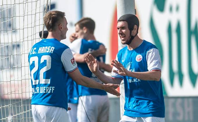 16 03 2024, Soccer, GER, Men, 2 Soccer Bundesliga, 2 Bundesliga, 2 FBL, Matchday 26, FC Hansa Rostock SpVgg Greuther Fürth 1 0 Jasper van der Werff FC Hansa Rostock, left and Damian Roßbach FC Hansa Rostock, right celebrate the goal for 1 0 Rostock Ostseestadion Mecklenburg Vorpommern Germany