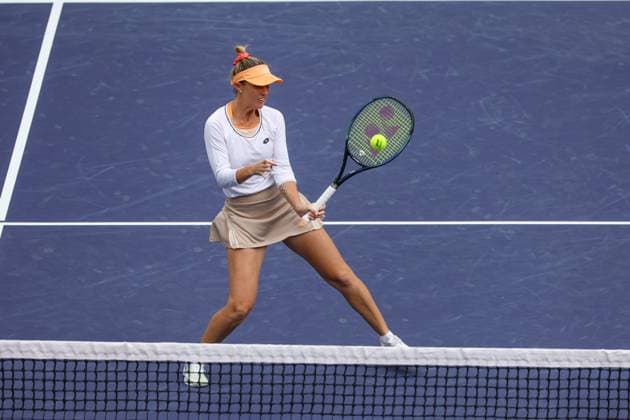 INDIAN WELLS, CA - MARCH 16: Storm Hunter (AUS) hits a volley during the WomenÕs Doubles Final at the BNP Paribas Open on March 16, 2024 at Indian Wells Tennis Garden in Indian Wells, CA. (Photo by George Walker Icon Sportswire) TENNIS: MAR 16 BNP Paribas Open EDITORIAL USE ONLY Icon240316005