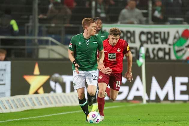 Marcel Halstenberg Hannover 96 and Daniel Hanslik 1 FC Kaiserslautern fight for the ball, 2 Bundesliga, Hannover 96 vs 1 FC Kaiserslautern, HDI Arena, 16 03 2024, Hannover, Germany