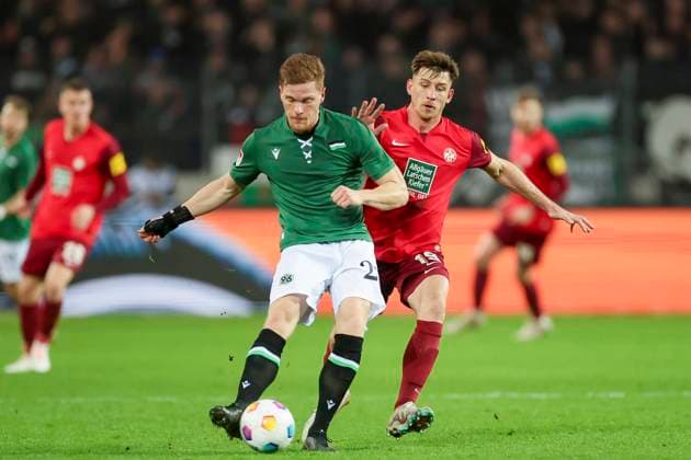 Marcel Halstenberg Hannover 96 and Daniel Hanslik 1 FC Kaiserslautern fight for the ball, 2 Bundesliga, Hannover 96 vs 1 FC Kaiserslautern, HDI Arena, 16 03 2024, Hannover, Germany