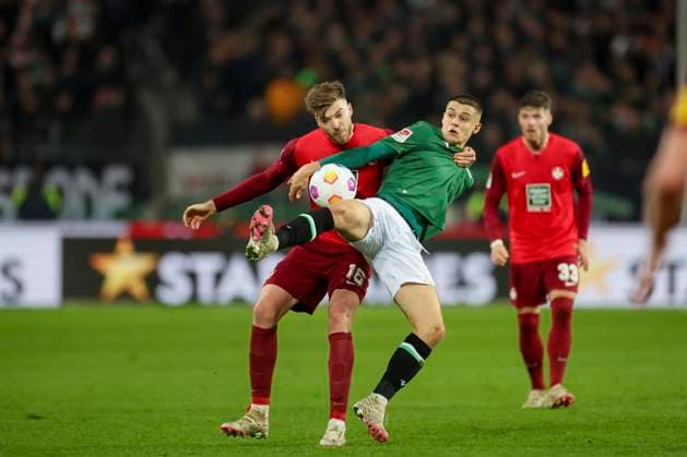 Nicolo Tresoldi Hannover 96 and Julian Niehues 1 FC Kaiserslautern fight for the ball, 2 Bundesliga, Hannover 96 vs 1 FC Kaiserslautern, HDI Arena, 16 03 2024, Hannover, Germany