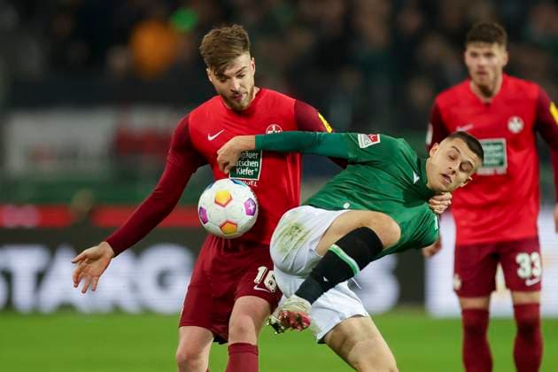 Nicolo Tresoldi Hannover 96 and Julian Niehues 1 FC Kaiserslautern fight for the ball, 2 Bundesliga, Hannover 96 vs 1 FC Kaiserslautern, HDI Arena, 16 03 2024, Hannover, Germany