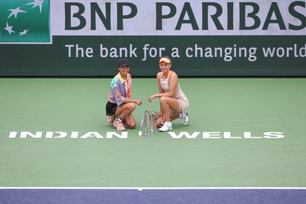 INDIAN WELLS, CA - MARCH 16: Su-Wei Hsieh (TPE) and Elise Mertens (BEL) pose with the trophy after winning the WomenÕs Doubles Final at the BNP Paribas Open on March 16, 2024 at Indian Wells Tennis Garden in Indian Wells, CA. (Photo by George Walker Icon Sportswire) TENNIS: MAR 16 BNP Paribas Open EDITORIAL USE ONLY Icon240316027