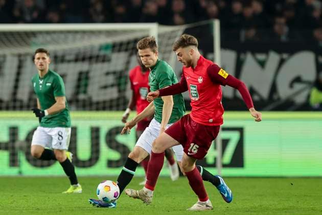 Fabian Kunze Hannover 96 and Julian Niehues 1 FC Kaiserslautern fight for the ball, 2 Bundesliga, Hannover 96 vs 1 FC Kaiserslautern, HDI Arena, 16 03 2024, Hannover, Germany