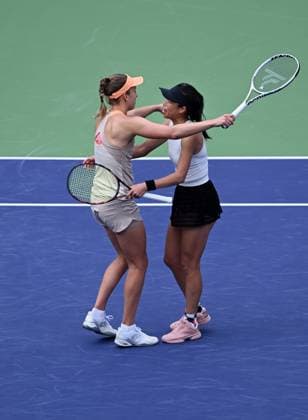 INDIAN WELLS, CA - MARCH 16: Elise Mertens (BEL) hugs her teammate Su-Wei Hsieh (TPE) on the court after winning a WTA, Tennis Damen tennis doubles finals match played on March 16, 2024 during the BNP Paribas Open tennis tournament played at the Indian Wells Tennis Garden in Indian Wells, CA. (Photo by John Cordes Icon Sportswire) TENNIS: MAR 16 BNP Paribas Open EDITORIAL USE ONLY Icon506240316004
