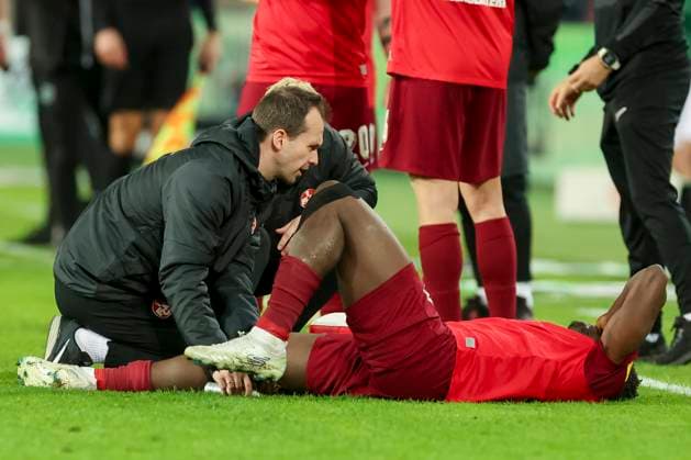 Ragnar Ache 1 FC Kaiserslautern is treated injured on the pitch, 2 Bundesliga, Hannover 96 vs 1 FC Kaiserslautern, HDI Arena, 16 03 2024, Hannover, Germany