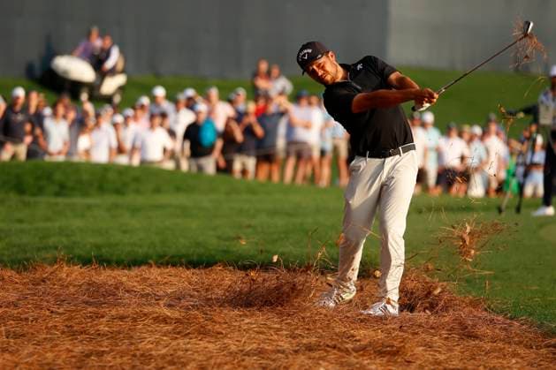 PONTE VEDRA BEACH, FL - MARCH 16: PGA, Golf Herren golfer Xander Schauffele hits his second shot out of the pine straw on the 18th hole during the third round of The Players Championship on March 16, 2024, at TPC Sawgrass in Ponte Vedra Beach, Florida. (Photo by Brian Spurlock Icon Sportswire) GOLF: MAR 16 PGA THE PLAYERS Championship EDITORIAL USE ONLY Icon24031638