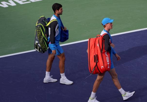Jannik Sinner of Italy and Carlos Alcaraz of Spain walk onto court after the rain delay BNP Paribas Open, Tennis, Day 11, Indian Wells Tennis Garden, California, USA - 16 Mar 2024  Copyright: xEllaxLing Shutterstockx 14386187dt
