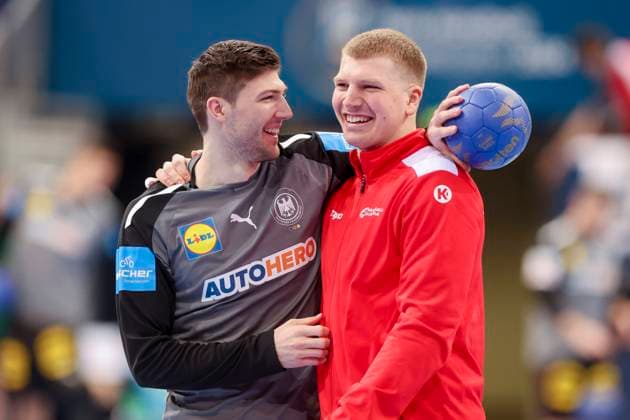 Lukas Zerbe Germany and Lukas Hutecek Austria laugh, Handball 2024 IHF Men s Olympic Qualification Tournament, Austria vs Germany, ZAG Arena, 17 03 2024, Hannover, Germany