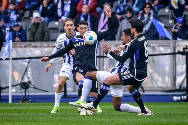 Soccer 2 Bundesliga, Hertha BSC FC Schalke 04 17 03 2024, xdanx, Soccer 2 Bundesliga, Hertha BSC FC Schalke 04, v l Michal Karbownik Hertha BSC 6 ,Simon Terodde FC Schalke 04 9 ,Jeremy Dudziak Hertha BSC 19 ,Danny Latza FC Schalke 04 8 ,duel, duel, fight, tackle DFL DFB REGULATIONS PROHIBIT ANY USE OF PHOTOGRAPHS as IMAGE SEQUENCES and or QUASI VIDEO Photo Daniel Lakomski Mix1 Berlin Olympiastadion Berlin Berlin Germany EN Copyright: xDanielxLakomskix